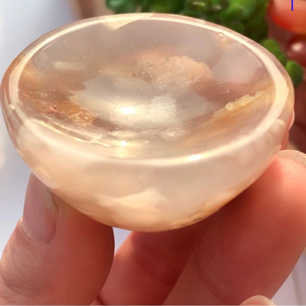 Stunning real gemstone peach and milky white colored crystal ball holder